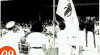 Foto pasukan pembawa panji PON sedang melakukan pengibaran bendera PON di Stadion Sriwedari, Solo, 9 September 1948.